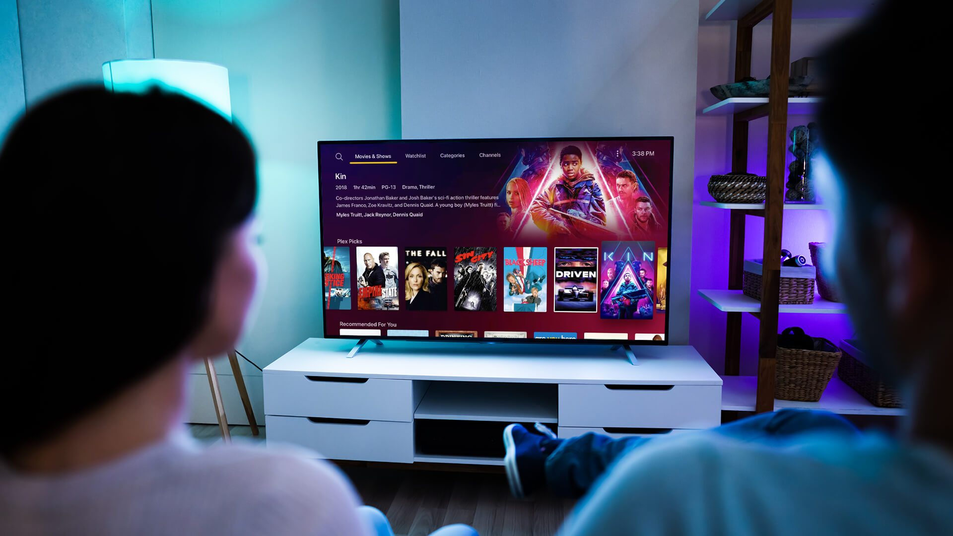 A person watching tv in the Plex app